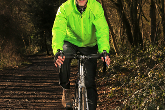 Richard cycling in a wood