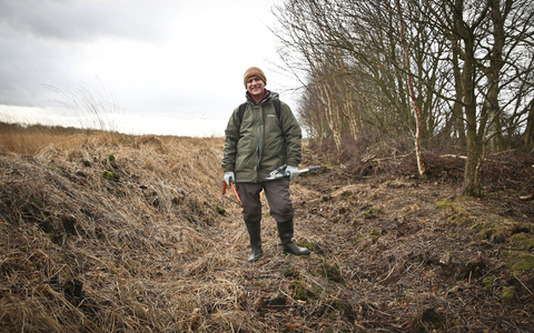 Tim standing in ditch