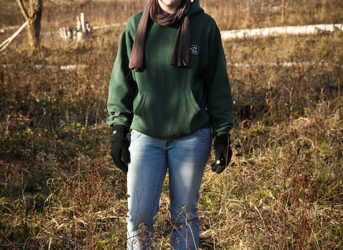 Elaine stands on a nature reserve