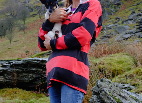 Emma with her dog in the hills